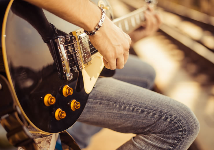 Point-Music-Aulas-de-musica-Guitarra